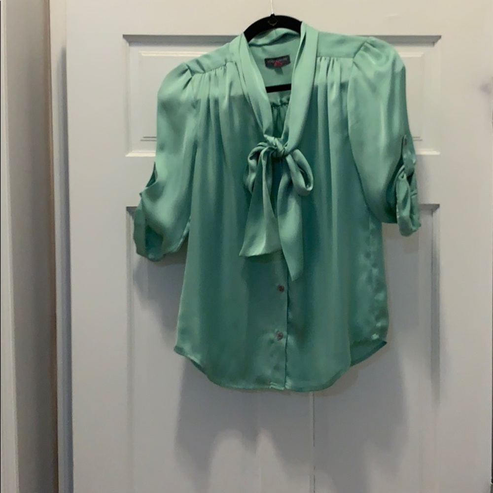 Green silk blouse